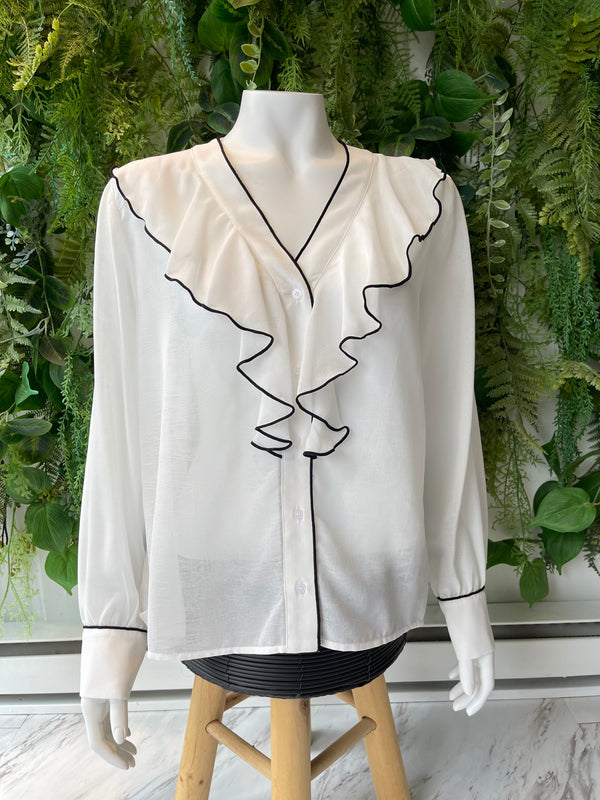 RITA RUFFLE TOP